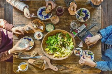 Wooden Table with Vegetarian Food and Salad